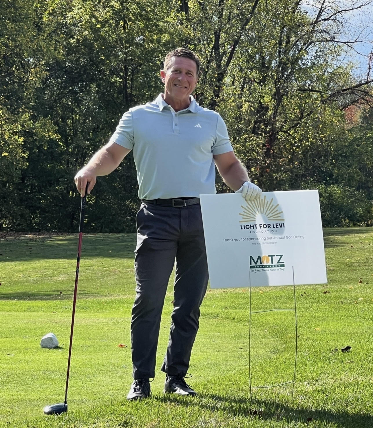 Motz representative supporting the Light for Levi Foundation at a local golf outing
